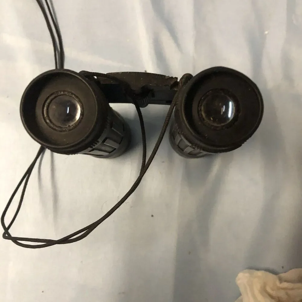BUSHNELL 12 X 25 240 Ft/1000 Yds‎ Binoculars